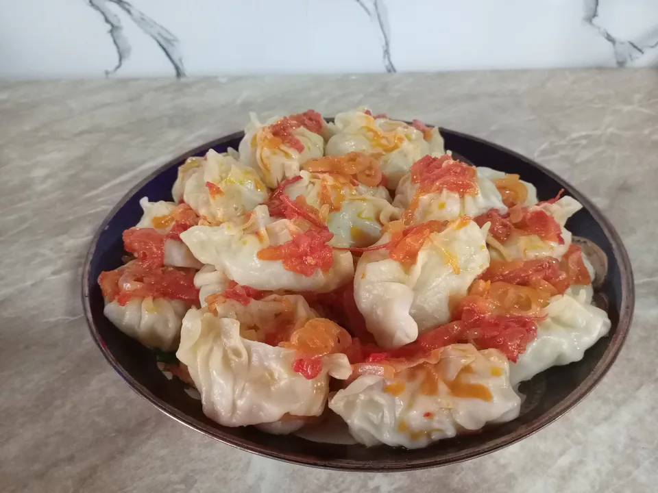 Manti xamirli taom.