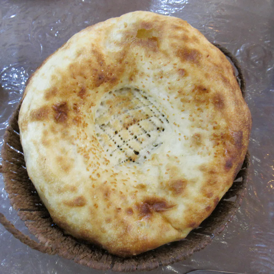 Tandyr nan at a street cafe. Samarkand, Uzbekistan.