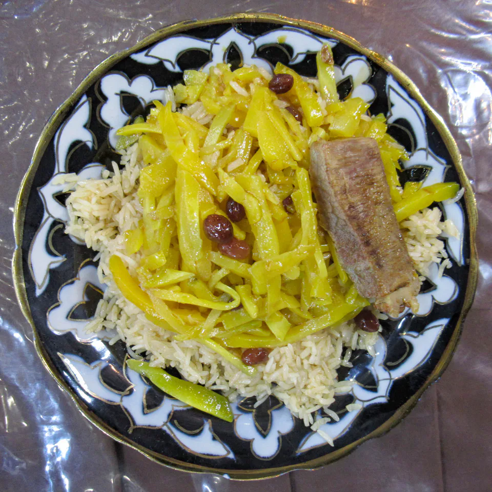 Plate of pilaf in a street cafe. Samarkand, Uzbekistan.