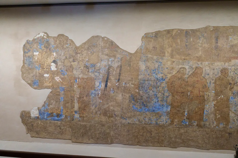Afrasiab murals at the Afrasiab Museum in Samarkand, Uzbekistan, May 2026. Dating to the 7th century, these ancient wall paintings depict diplomatic encounters and aspects of Sogdian court life, refle
