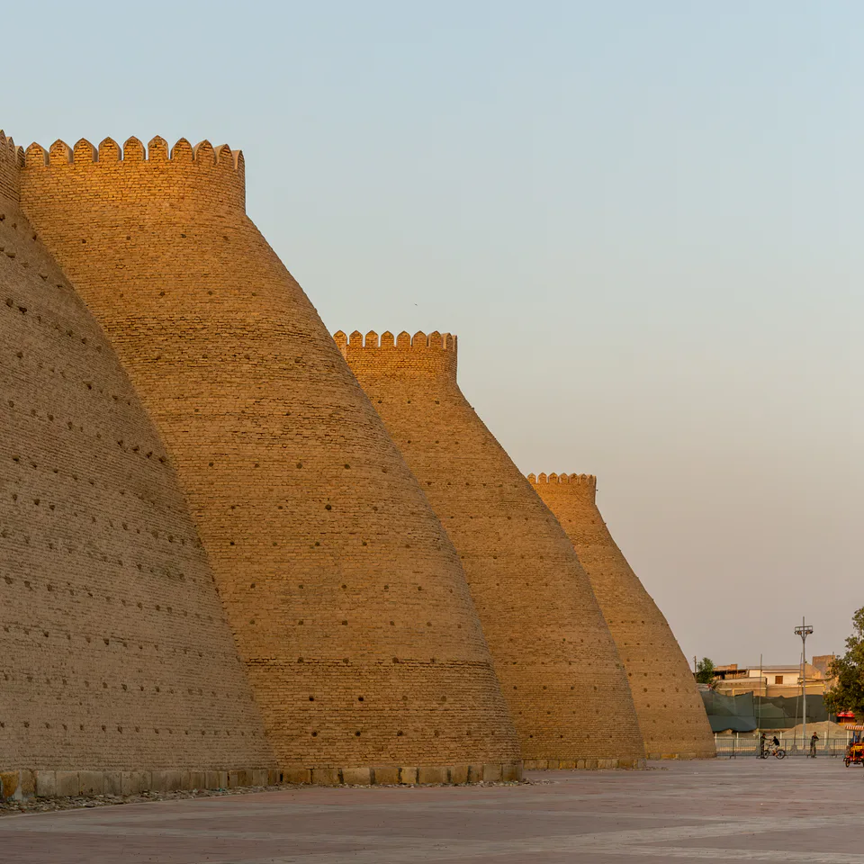 Ark fortress walls in the golden hour. Bukhara, Uzbekistan.
