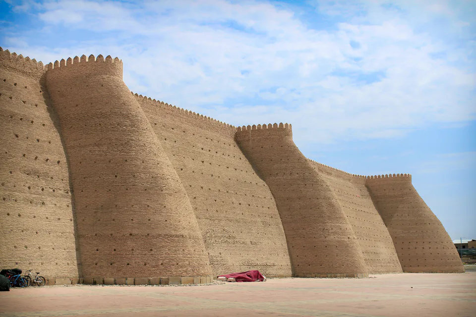 Wall with towers of the Ark fortress. Bukhara, Uzbekistan.