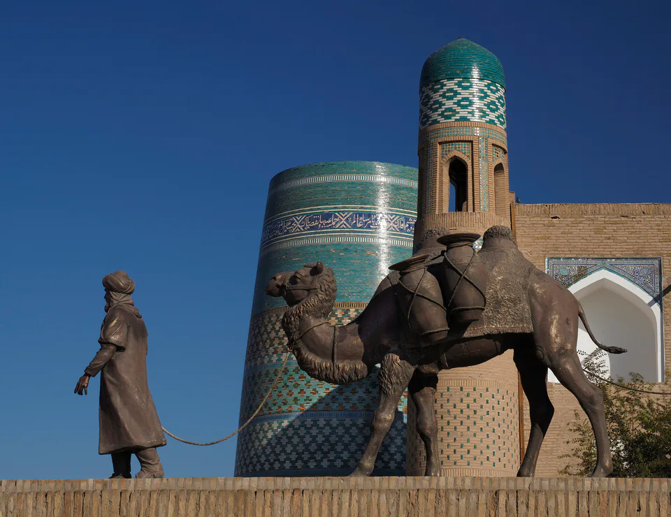 Khiva - town of The Silk Road, with Caravan entering to Ota gate. Uzbekistan