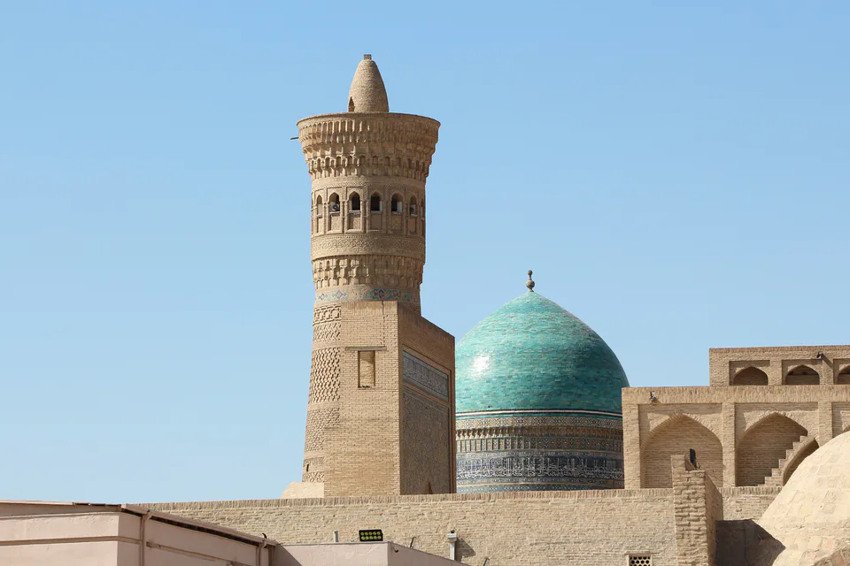 Kalan Minaret and dome of Mir-i-Arab madrasa, Bukhara, Uzbekistan