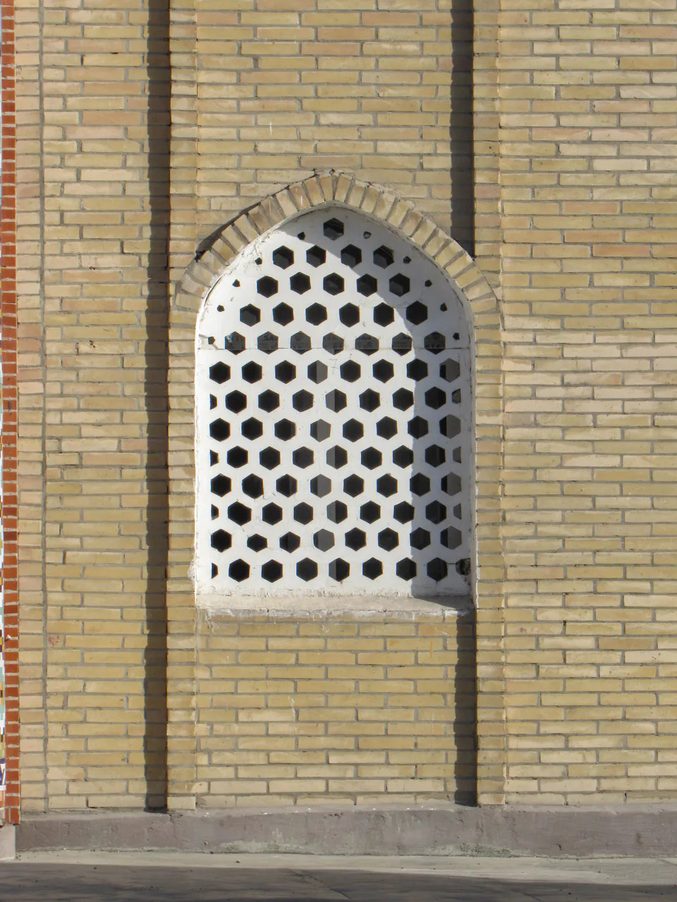 Window of Kamol-kazi medrese. Kokand, Fergene Region, Uzbekistan.
