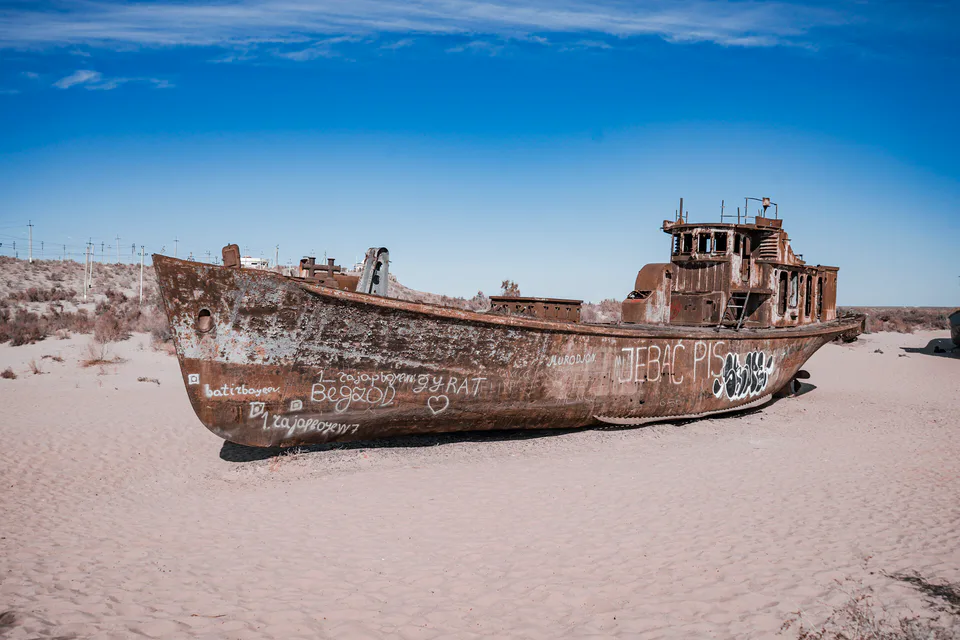 The ship graveyard in Moynaq, Karakalpakstan, Uzbekistan, photographed in September 2025. Abandoned fishing vessels rest on the former seabed of the Aral Sea, bearing witness to one of the world’s mos