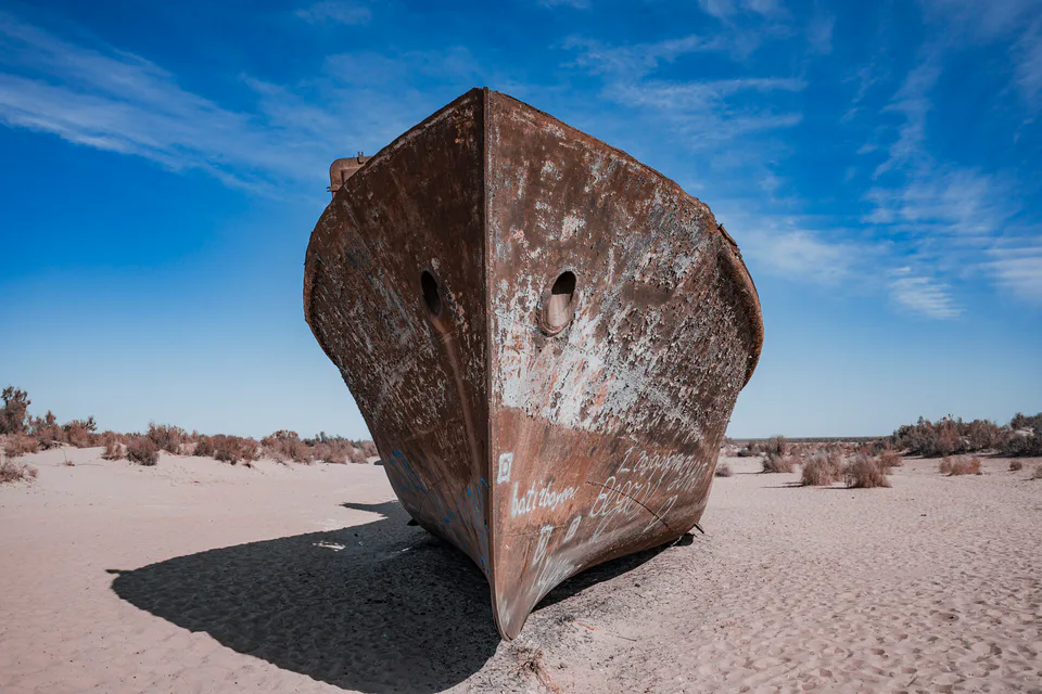 The ship graveyard in Moynaq, Karakalpakstan, Uzbekistan, photographed in September 2025. Abandoned fishing vessels rest on the former seabed of the Aral Sea, bearing witness to one of the world’s mos