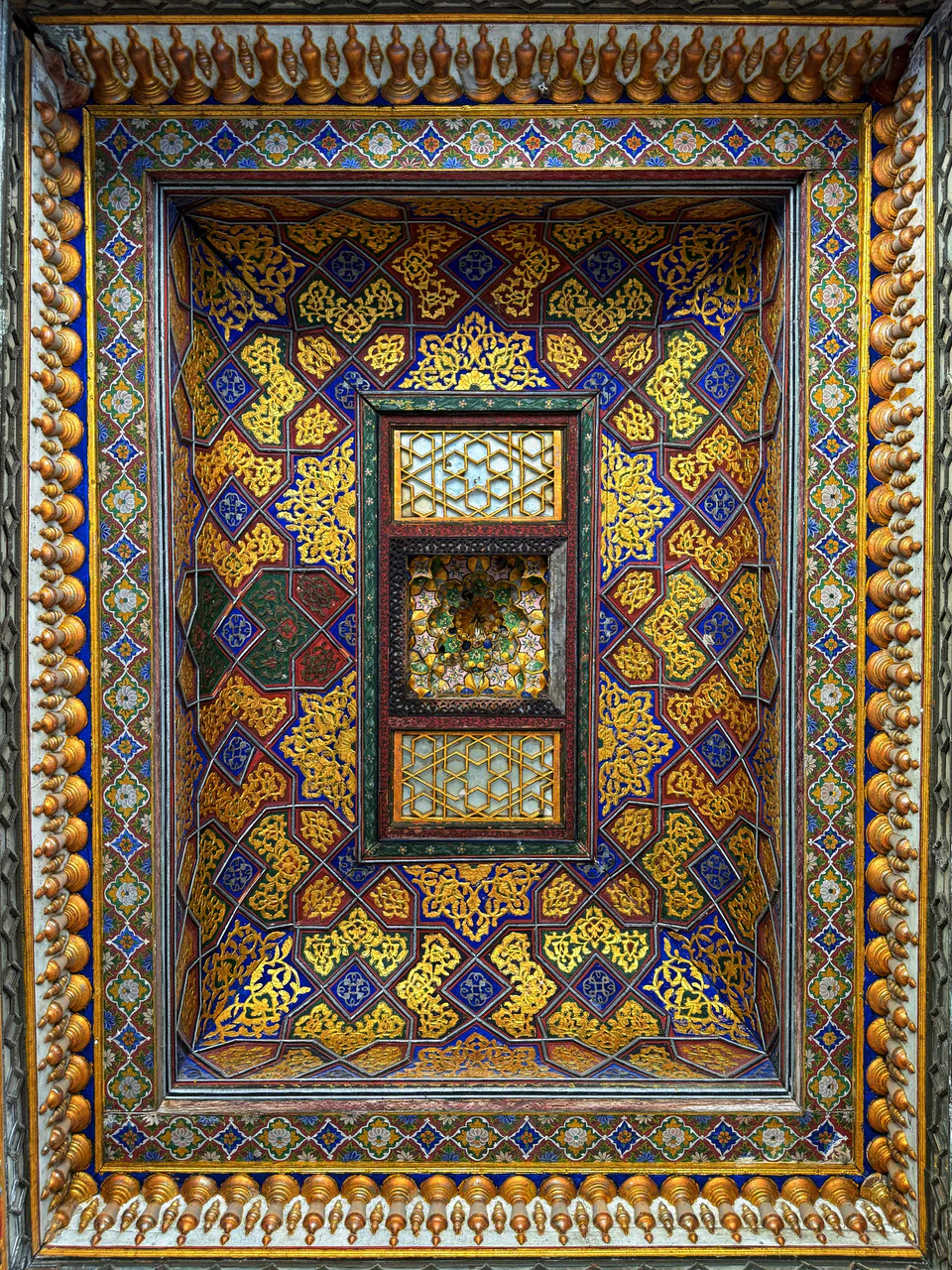 Painted ceiling of the guest pavilion's iwan.