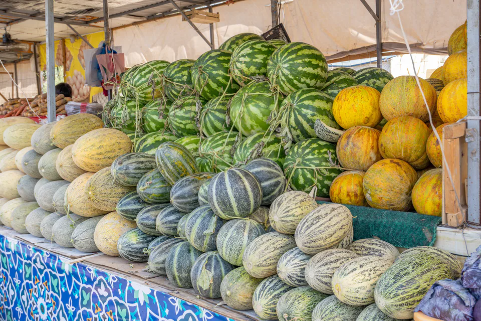 Melons and watermelons are sold at the Chorsu market in Tashkent, Uzbekistan, in August 2025.