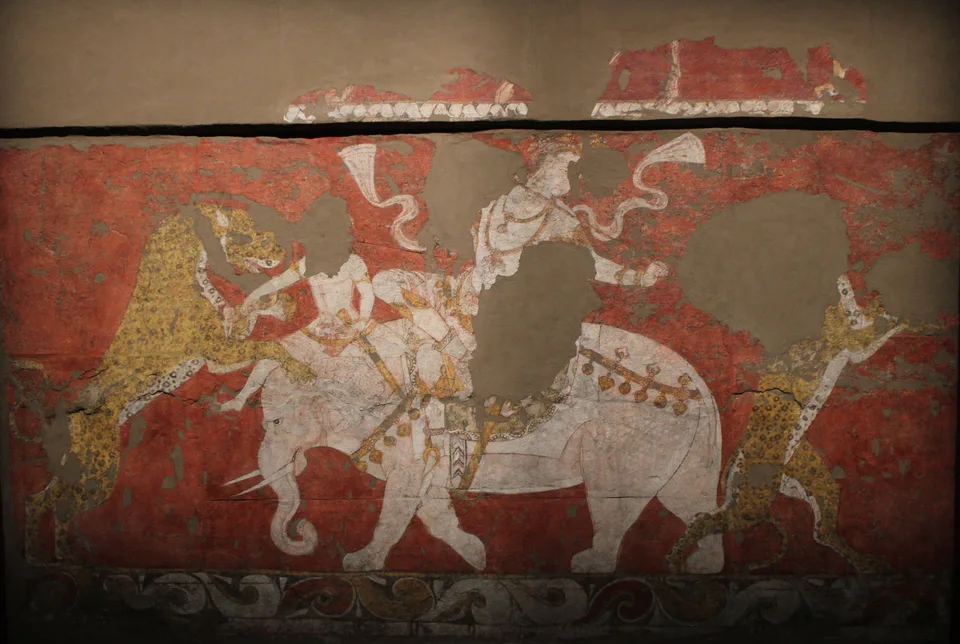 Wall painting from the Varakhsha Palace (Bukhara, Uzbekistan): royal figure on the back of an elephant fighting wild beasts. About 730. Tashkent, State Museum of Arts of Uzbekistan (inv. no1618).