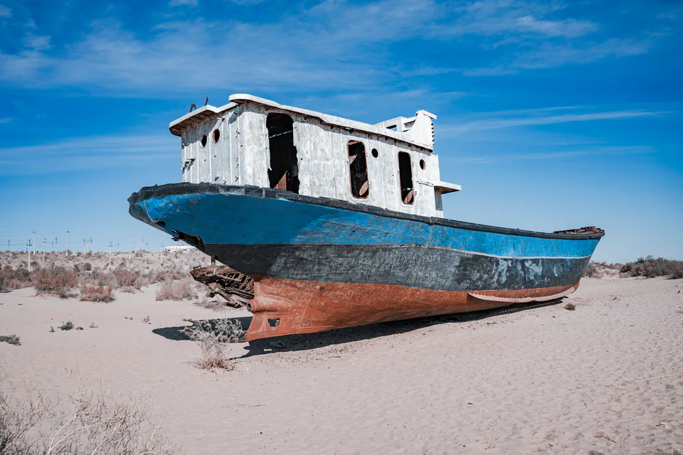 The ship graveyard in Moynaq, Karakalpakstan, Uzbekistan, photographed in September 2025. Abandoned fishing vessels rest on the former seabed of the Aral Sea, bearing witness to one of the world’s mos