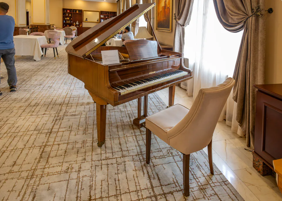 Grand piano at the lobby of Lotte Tashkent Palace hotel. Tashkent, Uzbekistan.